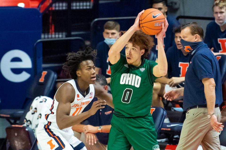 Jason Preston had 31 points, eight assists and 0 turnovers in a 77-75 loss against Ayo Dosunmu, left, and then-No. 8 Illinois on Nov. 27, 2020 in Champaign, Illinois.