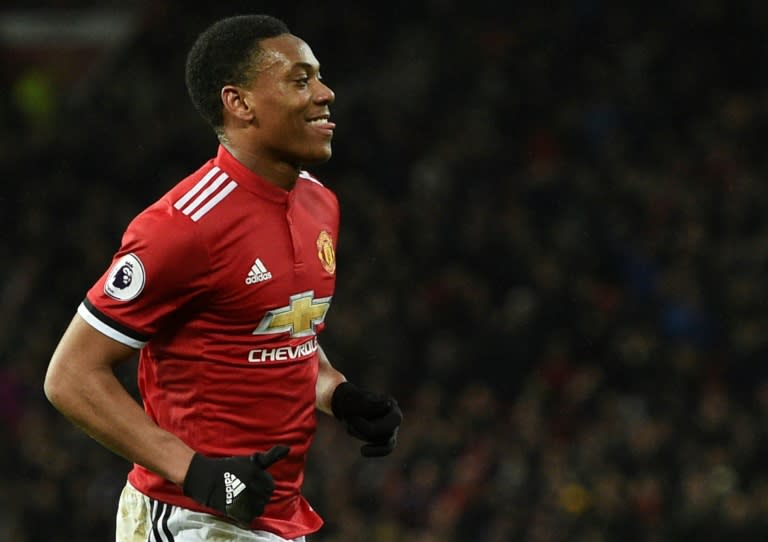 Manchester United's striker Anthony Martial celebrates scoring against Stoke City at Old Trafford in Manchester, north west England, on January 15, 2018