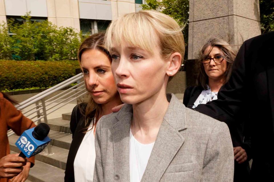 <p>Rich Pedroncelli, File/AP</p> Sherri Papini leaves the federal courthouse after her arraignment in Sacramento, CA on April 13, 2022.