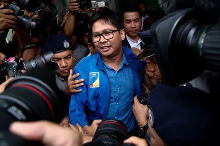 Reuters reporter Wa Lone talks to reporters as he leaves court in Yangon, Myanmar, December 27, 2017. REUTERS/Stringer