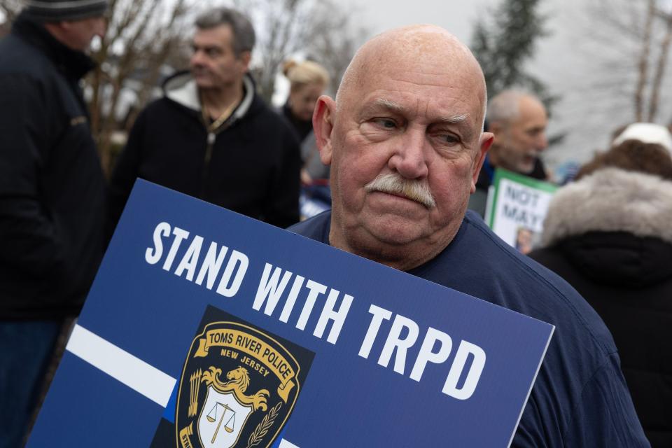 Between 80 and 90 people came out to a protest a proposed ordinance on the agenda for January 31 Township Council meeting that would eliminate two police captains jobs. During rally they were collecting signatures in an effort to invalidate the ordinance.