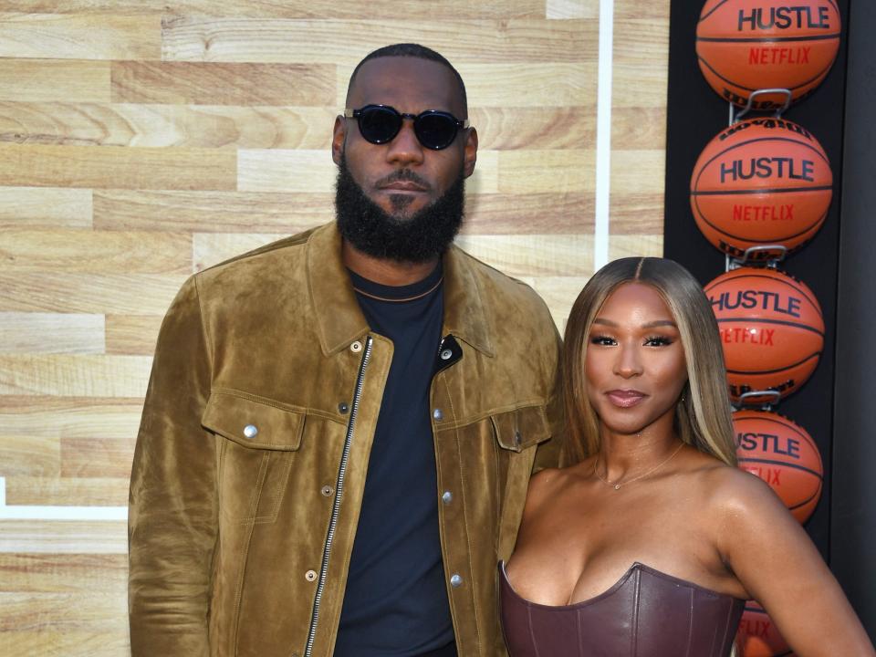 (L-R) LeBron James and Savannah James attends Netflix's "Hustle" World Premiere at Regency Village Theatre on June 01, 2022 in Los Angeles, California.