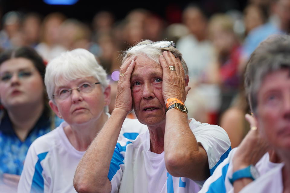 Members of the 1972 England lioness react during a screening of the FIFA Women's World Cup 2023 final between England and Spain at BOXPARK Wembley. (PA)
