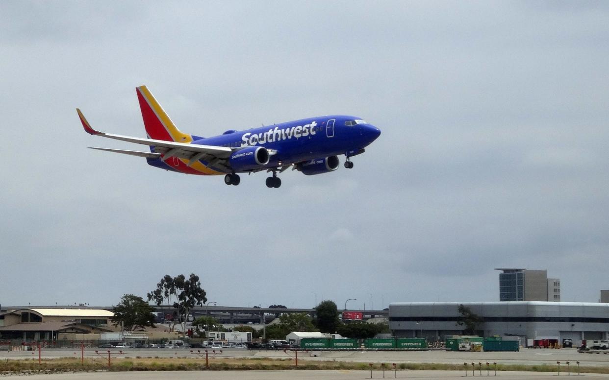 A Southwest Boeing 737, similar to the one pictured, made an emergency landing in Orlando on Tuesday - AFP