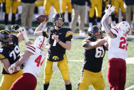 Iowa quarterback Spencer Petras (7) throws a pass during the second half of an NCAA college football game against Nebraska, Friday, Nov. 27, 2020, in Iowa City, Iowa. Iowa won 26-20. (AP Photo/Charlie Neibergall)