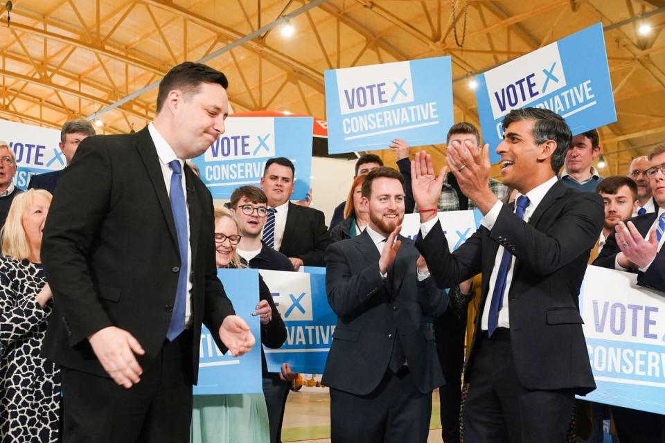Rishi Sunak looks on as Ben Houchen celebrates being returned as Tees Valley mayor (PA Wire)