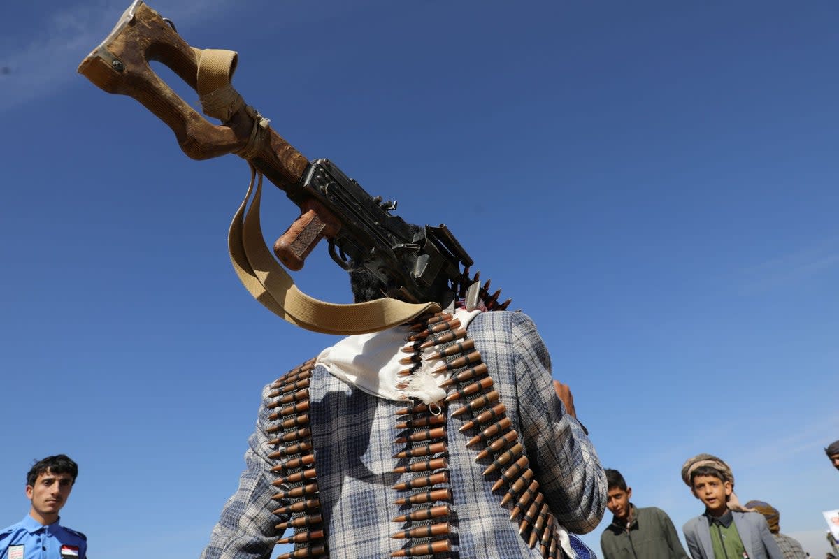 A man during a military parade for new Houthi recruits  (REUTERS)