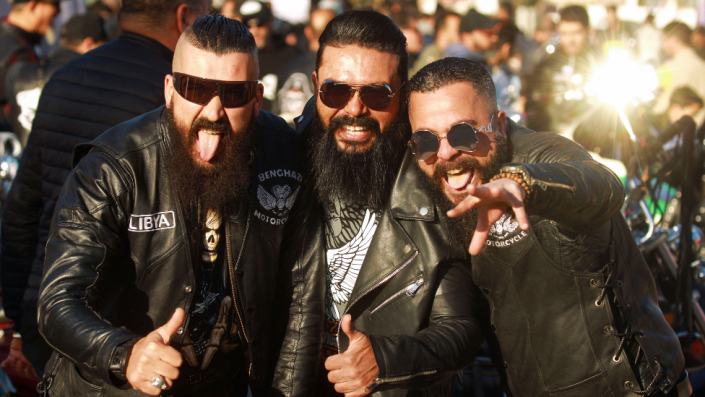 Three men in sunglasses and leather jackets at a festival organised by the Benghazi Motorcycles Club in Benghazi, Libya - Tuesday 15 March 2022