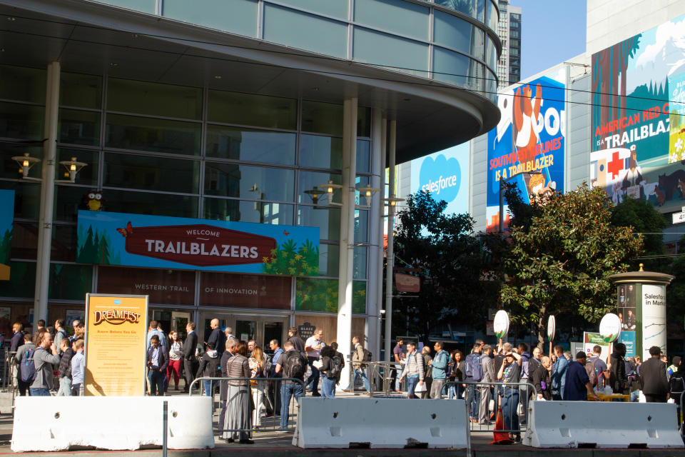 San Francisco, California - November 19th, 2019: A crowd of Dreamforce convention attendees are gathered outside the west entrance of the Moscone Center