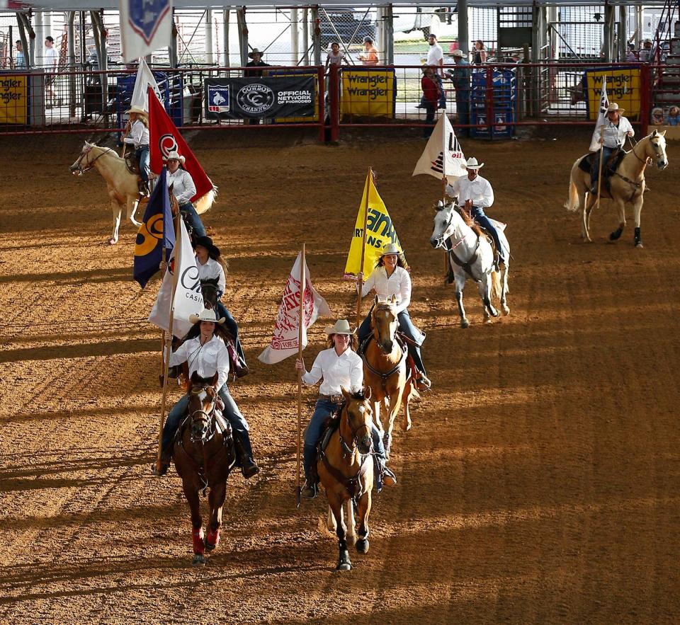 Riders partake in the grand entry of the 89th Annual Old Fort Days Rodeo on June 1, 2022, at Kay Rodgers Park in Fort Smith.