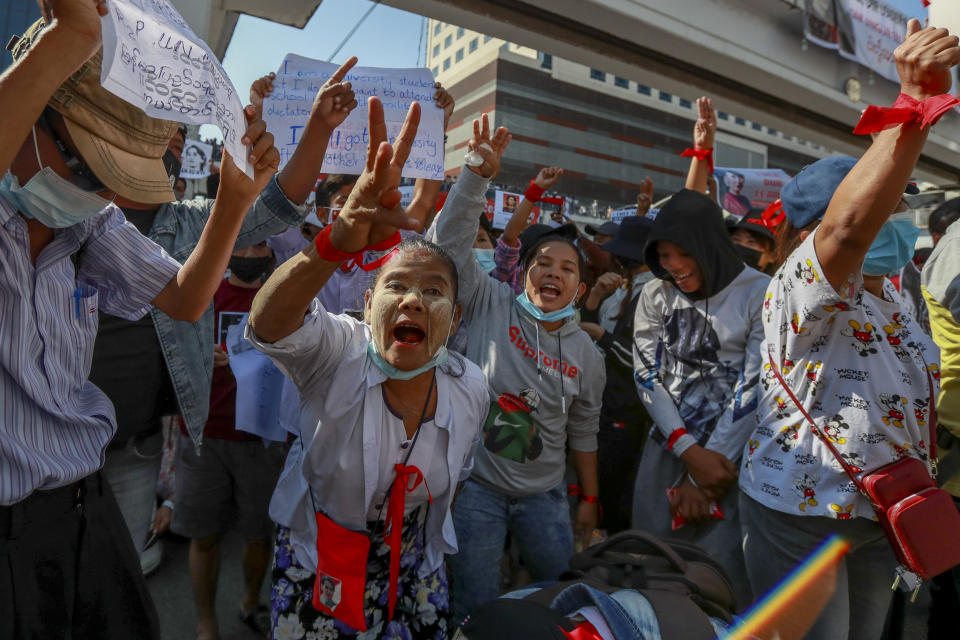 Demonstrators shout slogans calling for the release of detained Myanmar leader Aung San Suu Kyi during a protest in Yangon, Myanmar, Wednesday, Feb. 10, 2021. Protesters continued to gather Wednesday in Yangon breaching Myanmar's new military rulers ban of public gathering of five or more issued on Monday intended to crack down on peaceful public protests opposing their takeover. (AP Photo)