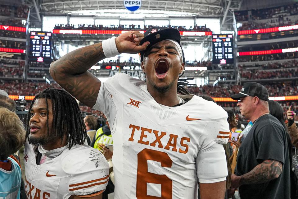 Texas quarterback Maalik Murphy celebrates last Saturday's Big 12 Championship Game win over Oklahoma State. The NCAA transfer portal opened this week and Murphy reportedly is being wooed by Ohio State and UCLA among others. All three Texas quarterbacks have offseason decisions to make.