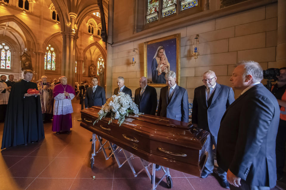 The coffin of Cardinal George Pell arrives to lay in state at St. Mary's Cathedral in Sydney, Wednesday, Feb. 1, 2023. Pell, who was once the third-highest ranking cleric in the Vatican and spent more than a year in prison before his child abuse convictions were overturned in 2020, died in Rome on Jan. 10 at age 81. (Giovanni Portelli/Archdiocese of Sydney, Pool Photo via AP)