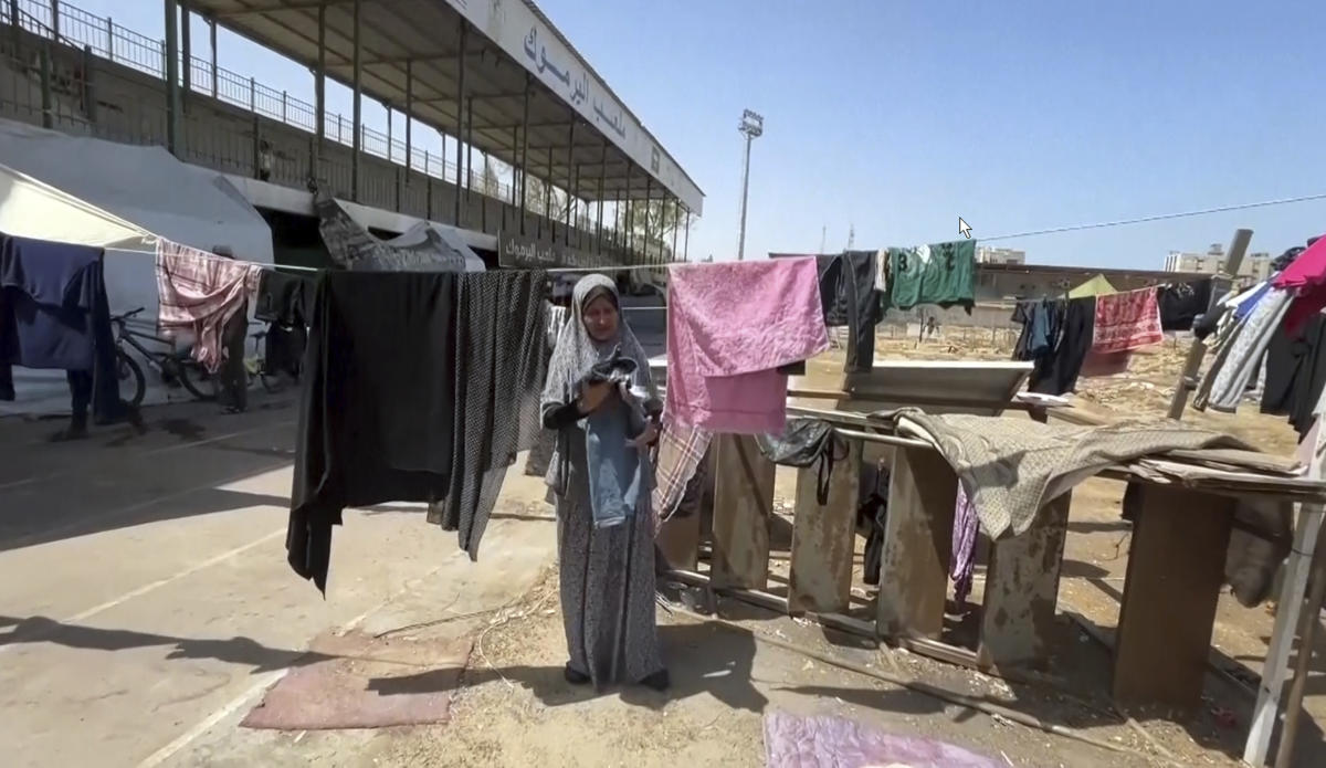 Gaza’s football stadium is now a refuge for thousands of displaced Palestinians