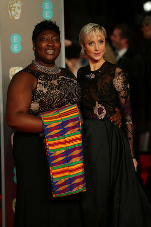 Andrea Riseborough and Lady Phyll arrive for the British Academy of Film and Television Awards (BAFTA) at the Royal Albert Hall in London, Britain, February 18, 2018. REUTERS/Hannah McKay