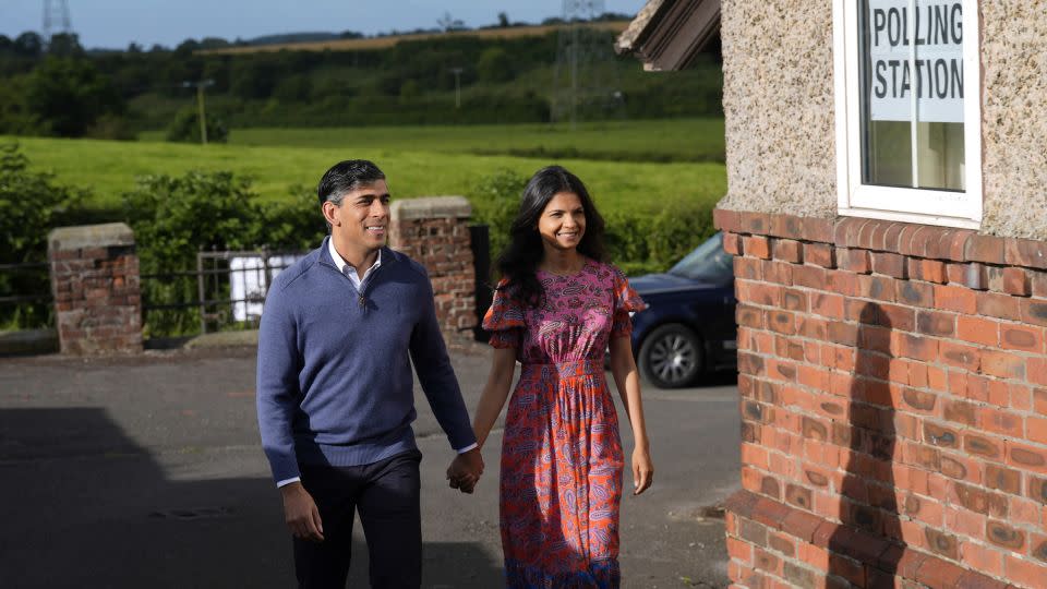 Sunak and his wife Akshata Murty voted at a village hall in northern England. - Danny Lawson/PA/AP