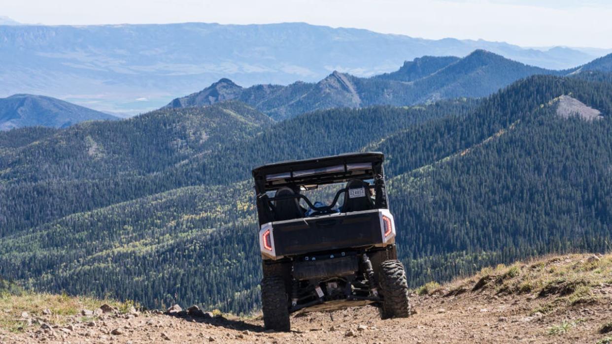 <div>An off-road 4-wheel drive utility all-terrain vehicle on a dirt road. (Photo by: Jon G. Fuller/VW Pics /Universal Images Group via Getty Images)</div>