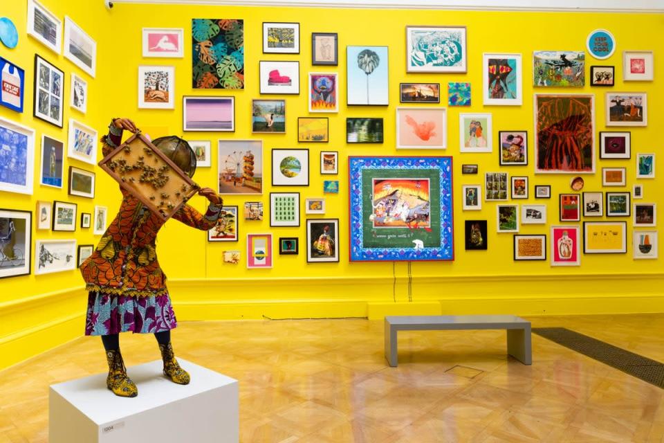 Installation view of one of the print rooms with Yinka Shonibare’s Beekeeper (Girl) II  (David Parry/ Royal Academy of Arts)