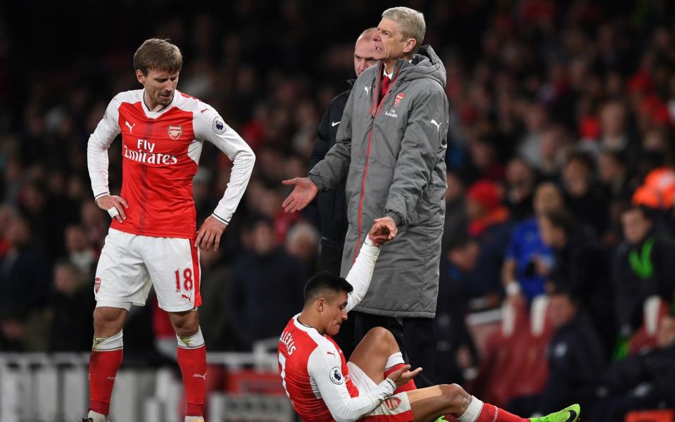 Alexis Sanchez reacts to having the ball thrown at him - Getty Images Europe