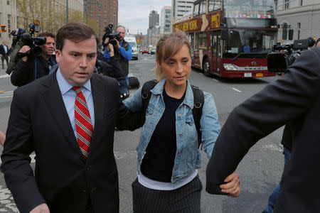 Actress Allison Mack, known for her role in the TV series "Smallville", departs after being granted bail following being charged with sex trafficking and conspiracy in New York, U.S., April 24, 2018. REUTERS/Lucas Jackson