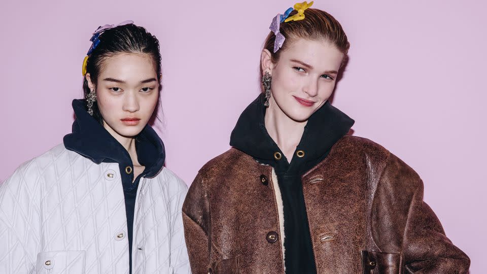 Coach has continued to cater to younger luxury buyers, this season offering distressed bomber jackets, collegiate hoodies and school blazers. - Nina Westervelt/WWD/Getty Images