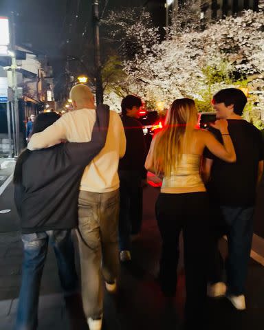 <p>Lauren Sanchez/Instagram</p> The group walking through the streets of Japan