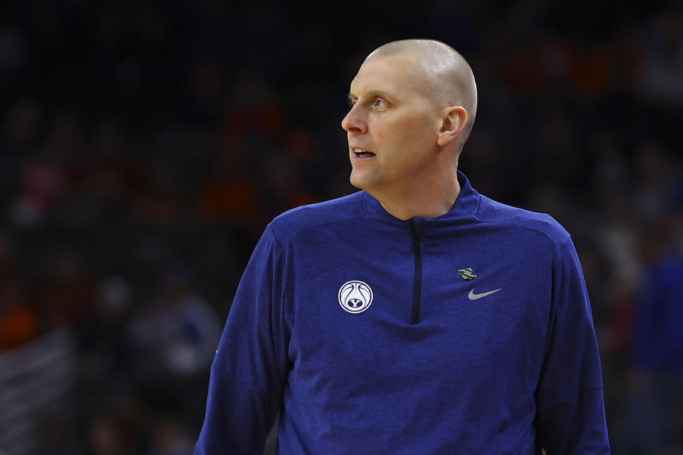 BYU head coach Mark Pope watches as his team played against Duquesne in the first half of a first-round college basketball game in the NCAA Tournament, Thursday, March 21, 2024, in Omaha, Neb. (AP Photo/John Peterson)