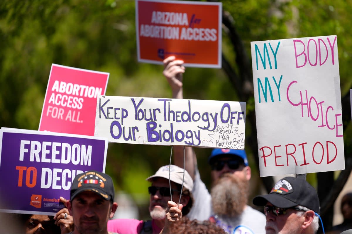 Abortion rights supporters gather outside the Capitol (AP)