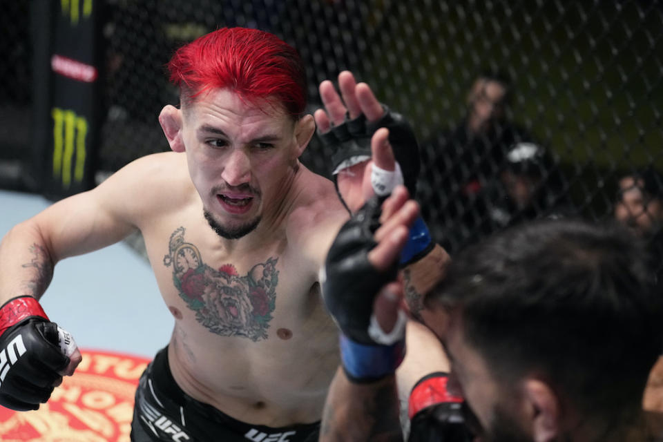 LAS VEGAS, NEVADA – MARCH 12: (L-R) Kris Moutinho punches Guido Cannetti of Argentina in their bantamweight fight during the UFC Fight Night event at UFC APEX on March 12, 2022 in Las Vegas, Nevada. (Photo by Chris Unger/Zuffa LLC)