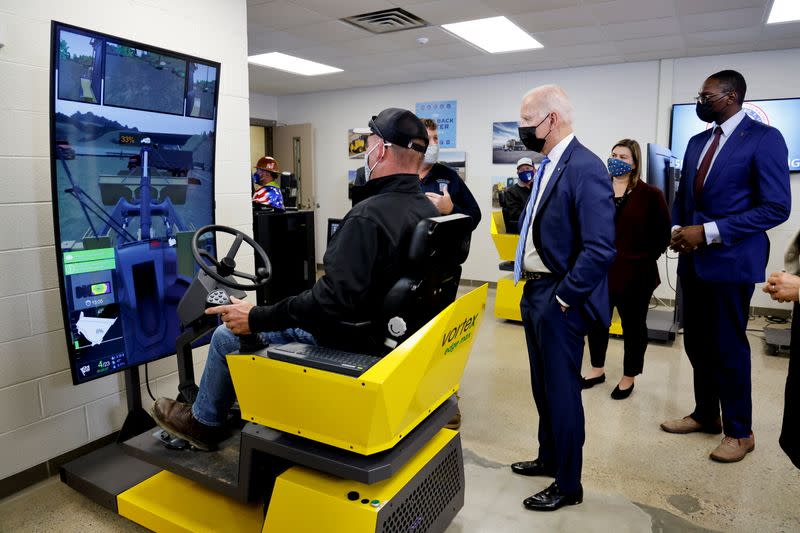 U.S. President Joe Biden tours the International Union of Operating Engineers Local 324 training facility