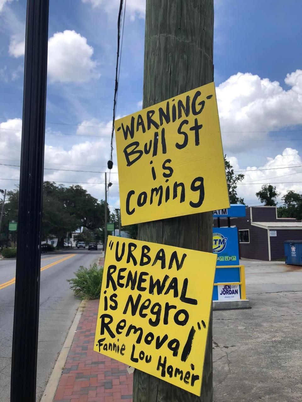 Local artist Panhandle Slim posted these sings to Waters Avenue after the announcement of a new café triggered fears of gentrification and displacement for the local community on the Eastside.