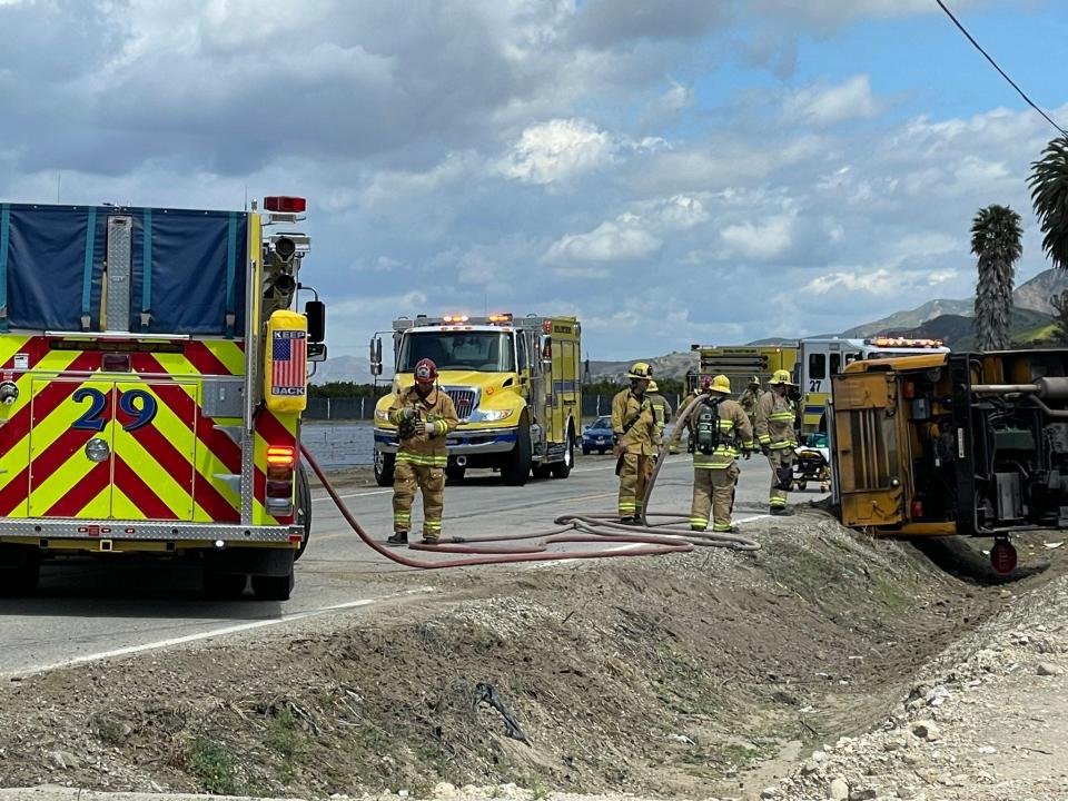 Ventura County firefighters respond to an overturned school bus Friday afternoon on South Mountain Road. Only minor injuries were reported.