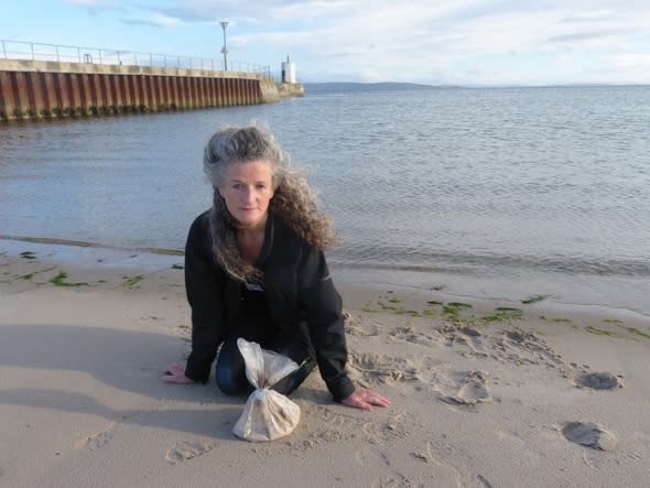 Woman finds bag of human ashes on UK beach