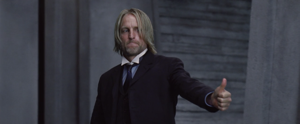 Haymitch giving a thumbs up