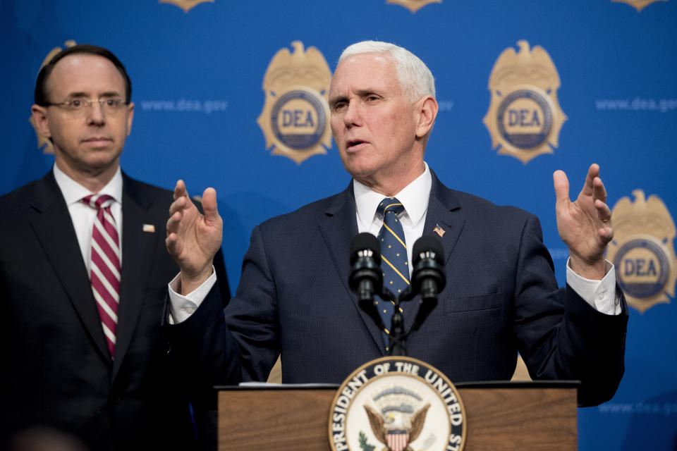 Vice President Mike Pence, accompanied by Deputy Attorney General Rod Rosenstein, speaks to Drug Enforcement Administration employees at their headquarters in Arlington, Va., Thursday, Jan. 31, 2019. (AP Photo/Andrew Harnik)