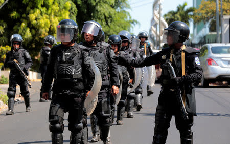 Riot police prepare to disperse protesters during a march to mark the one year anniversary of the protests against Nicaraguan President Daniel Ortega's government in Managua, Nicaragua April 17, 2019.REUTERS/Oswaldo Rivas