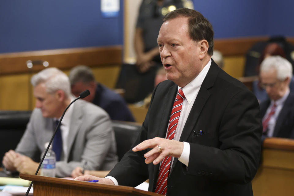 Attorney Craig Gillen, who represents defendant David Shafer, questions witness Terrence Bradley, Nathan Wade’s former business partner, during a hearing on the Georgia election interference case, Friday, Feb. 16, 2024, in Atlanta. The hearing is to determine whether Fulton County District Attorney Fani Willis should be removed from the case because of a relationship with Wade, special prosecutor, she hired in the election interference case against former President Donald Trump. (Alyssa Pointer/Pool Photo via AP)