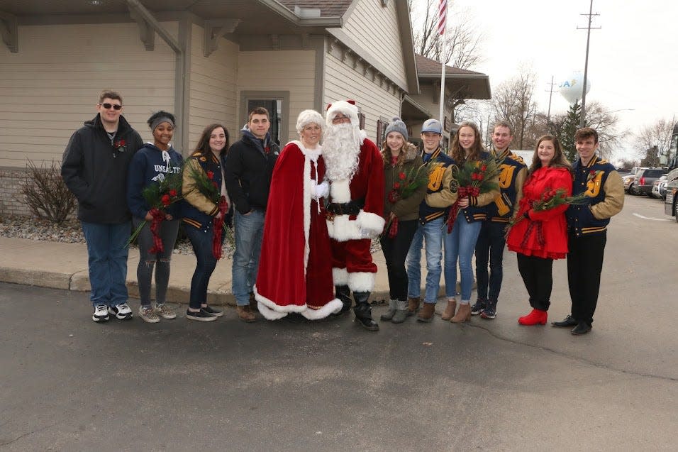 In this photo, Santa and Mrs. Claus are flanked by the Christmas in Ida Festival’s royalty court, Ida High School students who are selected to reign during the Christmas in Ida Festival.