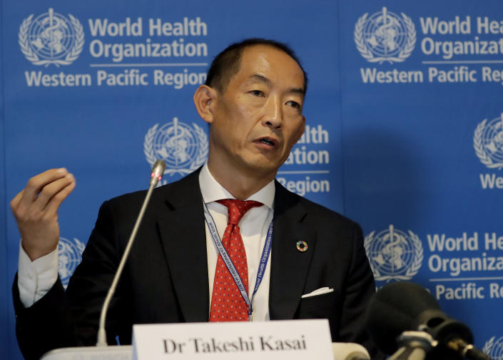 FILE – World Health Organization Regional Director for Western Pacific Takeshi Kasai addresses the media at the start of the five-day annual session Monday, Oct. 7, 2019, in Manila, Philippines. Current and former staffers have accused Kasai of racist, unethical and abusive behavior that has undermined the U.N. health agency’s efforts to curb the coronavirus pandemic. The allegations were laid out in an internal complaint filed in October 2021 and an email in January 2022 sent by unidentified “concerned WHO staff” to senior leadership and the executive board. Kasai denies the charges. (AP Photo/Bullit Marquez, File)