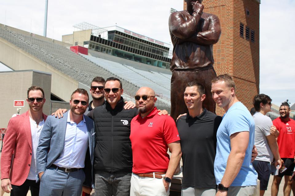 Sean McVay poses with former Miami teammates in front of his new statue. Los Angeles Rams head football coach Sean McVay became the 10th coach to have a statue in Miami University's prestigious Cradle of Coaches Plaza May 6, 2023. McVay was a former player at Miami and has been coaching in the NFL since 2009.  He became the youngest head coach in NFL history to win a Super Bowl (36) when the Rams beat the Bengals in 2022.