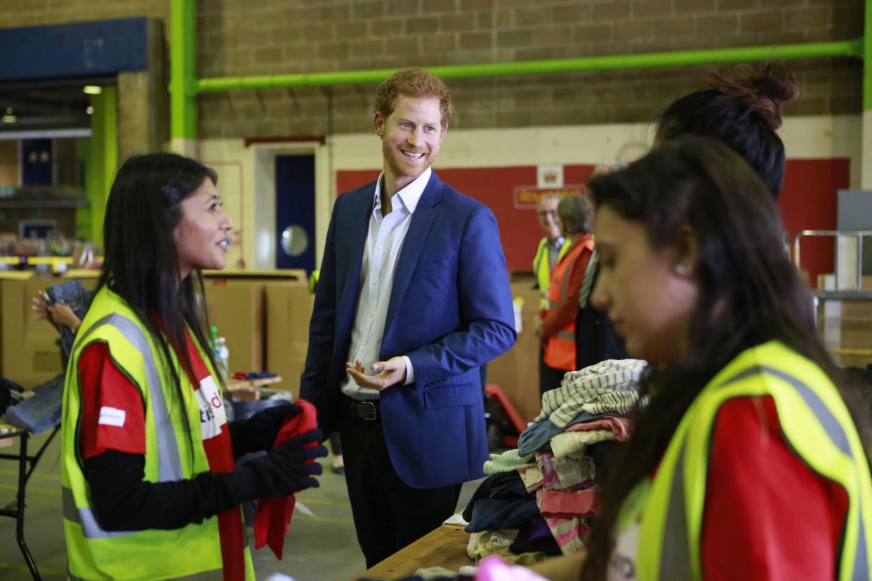 Prince Harry helped sort through a large number of donations: PA