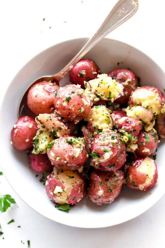 <p>Foodie Crush</p><p>Boiled potatoes get an infusion of butter and parsley to make this super easy, three-ingredient side dish!</p><p><strong>Get the recipe: <a href="https://www.foodiecrush.com/buttery-parsley-potatoes/" rel="nofollow noopener" target="_blank" data-ylk="slk:Buttery Parsley Potatoes;elm:context_link;itc:0;sec:content-canvas" class="link ">Buttery Parsley Potatoes</a></strong></p>