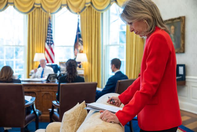 <p>Official White House Photo by Adam Schultz</p> Liz Sherwood-Randall refers to her notes in the Oval Office as the president meets with advisers on Feb. 14, 2023
