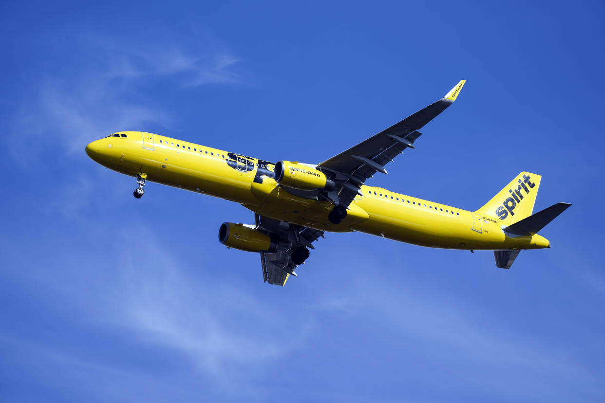 FILE - A Spirit Airlines jet approaches Philadelphia International Airport in Philadelphia, Pa., on Wednesday, Feb. 24, 2021. Spirit announced on Thursday, July 7, 2022, that it would again postpone a vote on the proposed merger with Frontier, a sign that it lacks shareholder support for the merger in the face of a rival bid by JetBlue Airways. Spirit delayed the vote by a week, until July 15. (AP Photo/Matt Rourke, File)