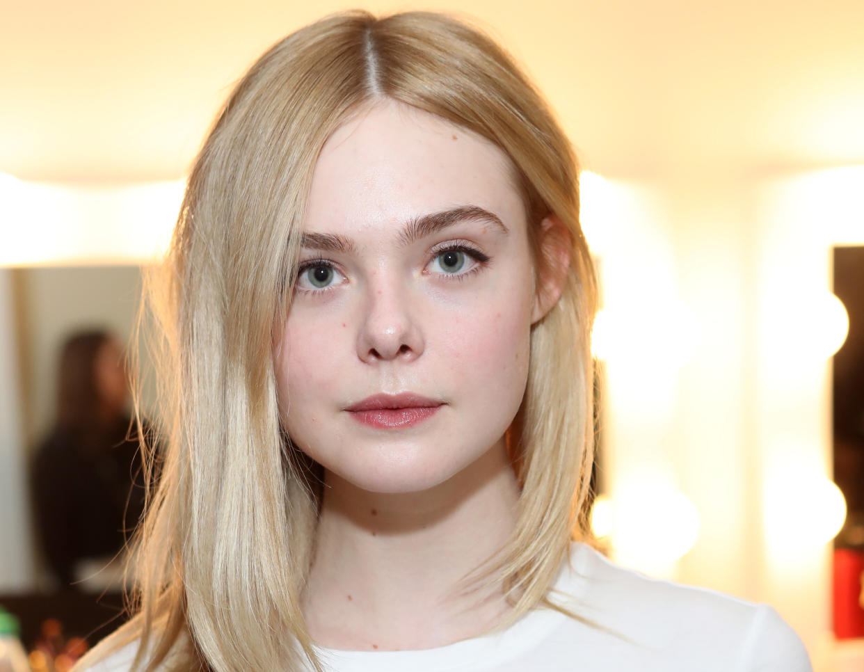 If there was an award for “best pink coat of all time,” Elle Fanning just won it