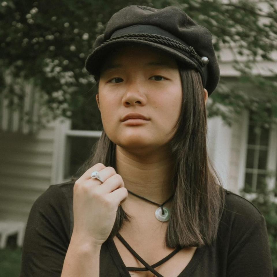 Kira Schaubeck poses for a portrait in Garden City on Long Island, New York in 2018. Schaubeck, 23, whose birth name is Tai Qiujing, was adopted from China and grew up on Long Island, New York.