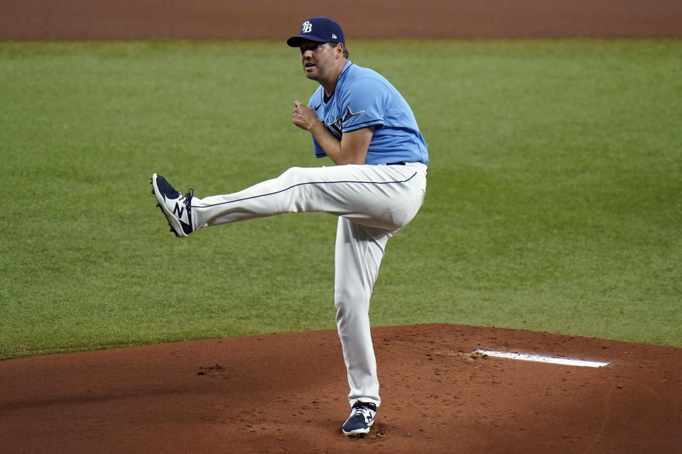Tampa Bay Rays starting pitcher Rich Hill follows through on a delivery to the New York Yankees during the first inning of a baseball game Thursday, May 13, 2021, in St. Petersburg, Fla. (AP Photo/Chris O'Meara)