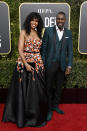 <p>Idris Elba eschewed the traditional tux in favour of an forest green suit by Ozwald Boateng at the 2019 Golden Globe Awards. <em>[Photo: Getty]</em> </p>