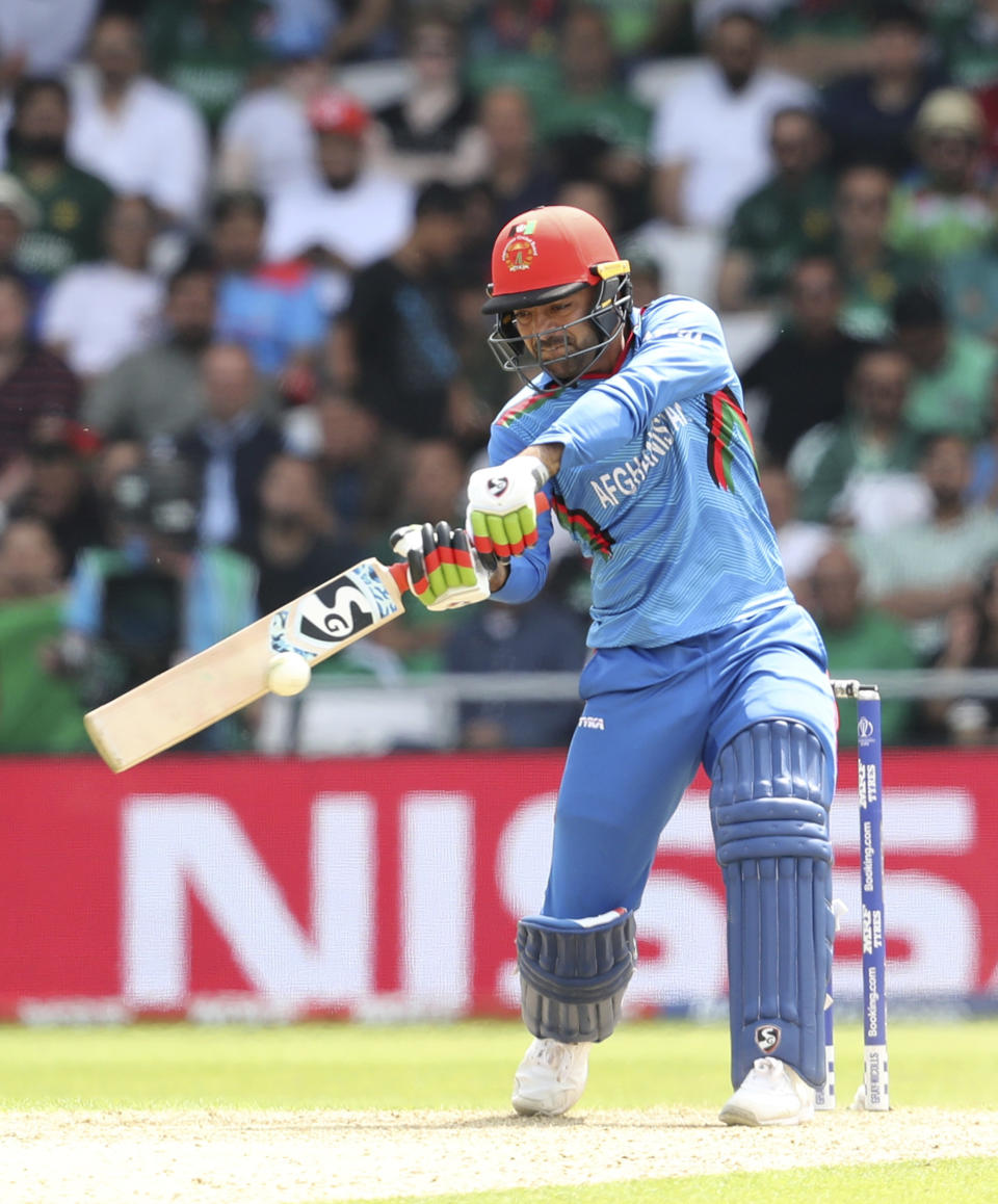 Afghanistan's Rashid Khan bats during the Cricket World Cup match between Pakistan and Afghanistan at Headingley in Leeds, England, Saturday, June 29, 2019. (AP Photo/Rui Vieira)