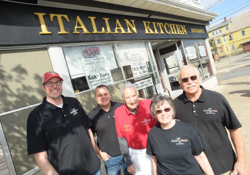 From left, Jeremy Jamoulis, Jonathan Jamoulis, Gus Tosches, JoAnne Zibelli, and Vinnie Zibelli, outside the Italian Kitchen, 1071 Main St., Brockton, on Wednesday, April  27, 2022.